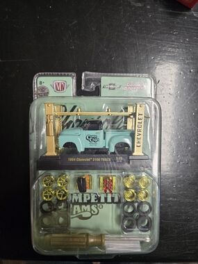 M2 Machines 1954 Chevrolet 3100 Toy Truck - CHASE !! Aqua with Gold Lift